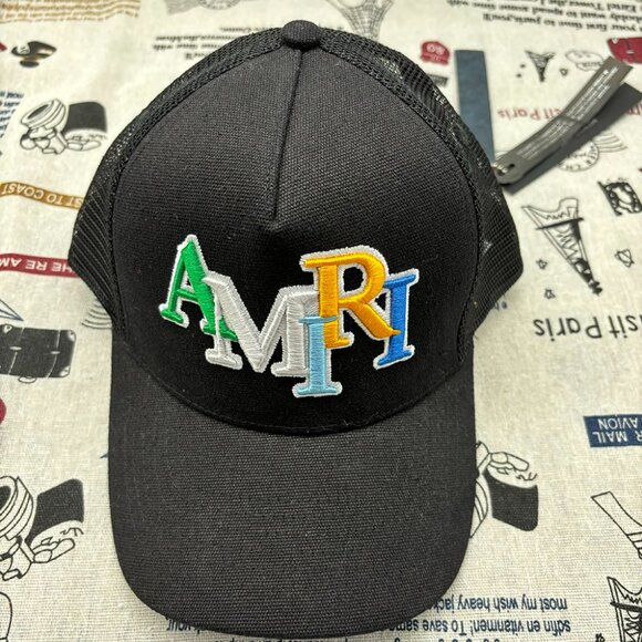 Amiri Follow Staggered Logo Trucker Cap In Cotton